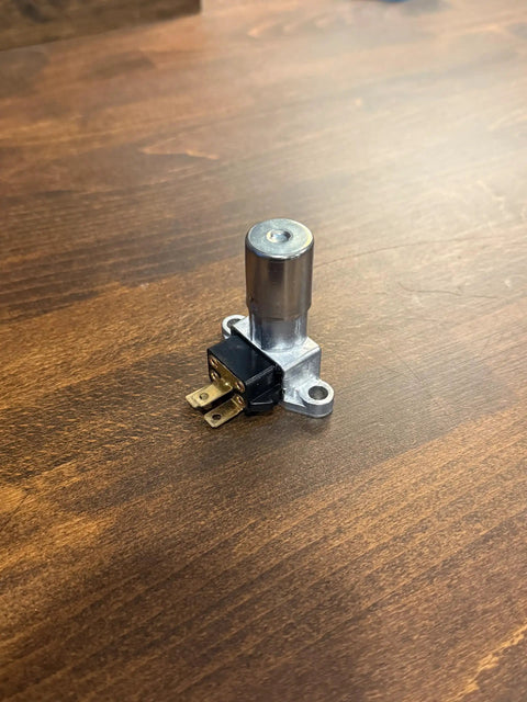 Heavy Duty Headlight Floor Dimmer Switch With Thick 14 Gauge Wiring Harness Pigtail And Straight Plug Connector For Gm Vehicles and Slick Plug and Play Rig on wooden table.