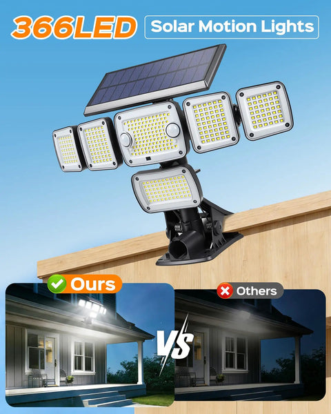 Solar Flood Lights Outdoor 6000LM 336 LEDs Dual Clip Motion Sensor Lights installed on wooden fence showcasing brightness comparison