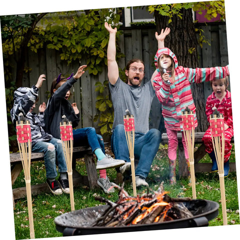 Group enjoying backyard gathering with 2 Pack Faux Bamboo Tiki Torches Outdoor Decor For Backyard Handmade Bamboo Torch Lights