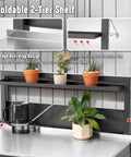 Outdoor Potting Bench With Storage Cabinet And Stainless Steel Work Surface showing foldable 2-tier shelf with plants