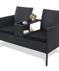 Two Seat Outdoor Patio Loveseat With Table In Black Wicker Rattan Outdoor Set With Washable Cushion Covers Weatherproof Garden Lounge Furniture For Backyard Lawn And Porch, side view with decorative items on table.