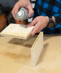 Person applying adhesive from SoloKit Instant Adhesive And Activator Set For Woodworking Bonds In Ten Seconds Cures To Four Thousand PSI