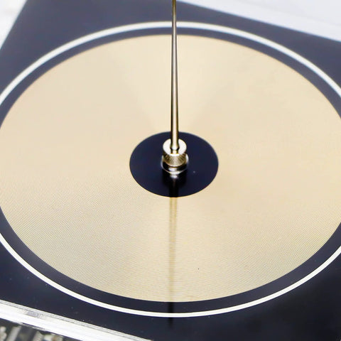 Close-up of Solid State Bluetooth Music Tesla Coil Desktop Toy With Touchable Arc Generator and Wireless Power Transmission.