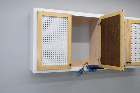 Cabinet Door Mounting Jig For Frameless And Face Frame Cabinets used on open cabinet, showing adjustable hinge attachment tool.