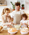 Family baking together with All-In-One Sourdough Gear With 2 Proving Baskets Oval And Round Starter Jar Dough Whisk Bench Scraper Lame Bread Sling And More A 22-Piece Complete Bake At Home Set For Artisan Bread Lovers The Perfect Gift For Women Moms Wives Bakers