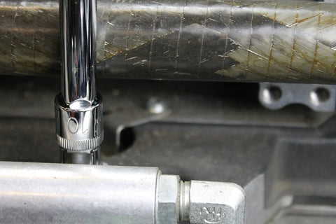 10mm Socket Set 100 Pack With Three Eighths Inch Drive 6 Point Shallow Sockets Pro Grade 6100 Series Steel in use on metal pipe