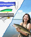 Woman holding fish next to 84Piece Fishing Lure Set With Tackle Box All In One For Saltwater And Freshwater Angling lure display