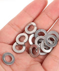 Spring Lock Washer Set In Stainless Steel 304 Hundred Piece One Quarter Inch Split Lock Washers And Gasket Assortment Kit For Bolt Repair And Industrial Fastening Applications, shown in hand