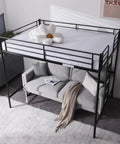 Heavy Duty Full Size Loft Bed With Solid Steel Frame And Flat Rungs For Teens And Adults Built Extra Tough For Years Of Chill Vibes Four Hundred Forty Pound Weight Limit No Box Spring Needed Sleek Black Space Saver with a plush white flower pillow on top.