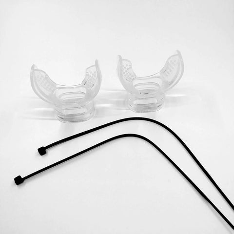 Two silicone diving mouthpieces clear shown with tie straps; part of 6 Pack Silicone Diving Mouthpieces Clear With Tie Strap For Breathing Tubes Snorkel Gear Accessory Kit Universal Caliber Fits Most Tubes Food Grade Silicone Disinfection Vacuum Packaging.