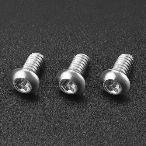 Tough As Nails 1/4-20 X 1/2 Inch Torx Security Machine Screws 304 Stainless Steel button head fasteners on a black background.