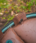 Close-up of 16 Gallon Tree Watering Bag Ring Heavy Duty PVC Plant Watering System for Trees and Shrubs with secure fastener