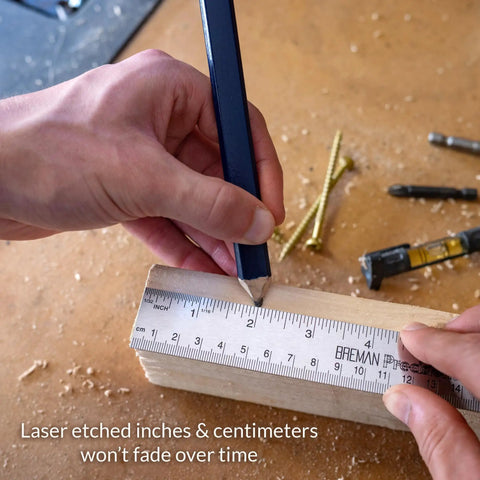 Hand using stainless steel ruler set three pack with one 6 inch and two 12 inch metal straight edges for measuring and drawing built tough.