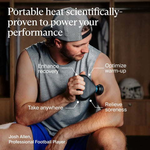 Person using Mini Plus Massage Gun With Heat For Faster Recovery On The Go on arm, locker room setting, enhancing recovery, relieving soreness.