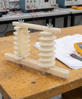 Plastic Coil Wire Winding Mold for Mini Motors and Micro Motors Six Layer Electrical Winding Frame for Precise Coil Placement Pro Grade Rewinding Tools for Micro Motor Repair Wide Applications 10.2 by 5.7 by 2.4 Inches 0.4 kW, six-layer plastic mold on lab bench