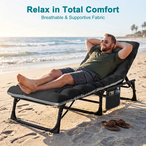 Man relaxing on Heavy Duty Outdoor Tanning Chair With 5 Position Folding Chaise Lounge And Pad on a beach.