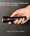 Person holding Rechargeable Tactical Flashlight 1400 Lumens With 802 Meter Long Beam Distance, compact and pocket-size.