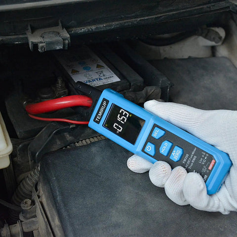 Digital Clamp Meter With U Shaped Jaw For AC And DC Current And Voltage Auto Range 4000 Counts Large Backlit LCD in use on car battery