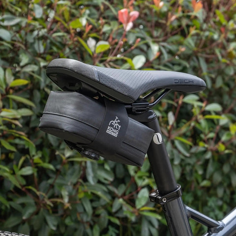 Grab-And-Go 8-In-1 Bike Repair Kit with CO2 Inflator and Cartridges saddle bag attached to bicycle seat