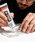 Heavy Duty Clear Industrial Glue Delivers A Hella Tough Bond And Precision Needle Tip for precise phone screen rhinestone placement.