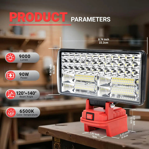 Cordless LED Work Light For M18 Battery, 9000 Lumens Flood Light With Dual USB Charging, shown on a workbench in a workshop.