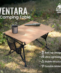 Ultralight Foldable Camping Table With Quick Setup, shown in grass with a mug and flashlight, emphasizing its outdoor use.