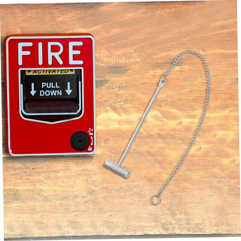 Emergency Stainless Steel Fire Alarm Button Hammer For Industrial Use displayed beside a fire alarm pull station on wood surface.