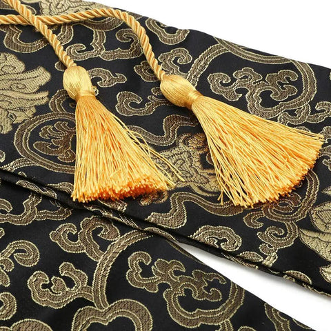 Intricate black and gold silk fabric with tassels of Silk Katana Sword Carrying Bag Case For Japanese Samurai Premium Soft Silk Sleeve