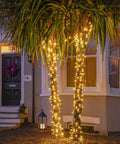 Bright 100 LED String Lights Indoor Outdoor 33 Ft With 8 Modes Warm White Plug In Connectable Fairy Twinkle Lights on trees