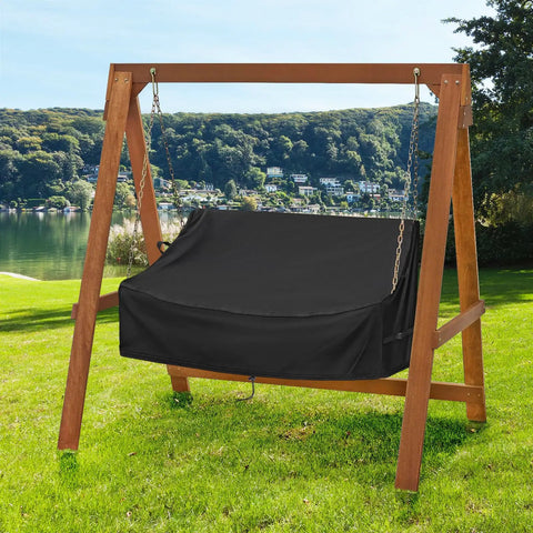 Waterproof Porch Swing Cover For Outdoor Patio Swings Garden Hammock Gliders And Hanging Benches Size 62 By 26 By 15 To 21 Inches Made From 420D Oxford Fabric With Sealed Seams For All Weather Protection And Easy Fit, shown on wooden swing frame.