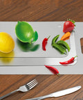 Three Piece Stainless Steel Cutting Board Set with fruits and vegetables on wooden table, showing different board sizes.