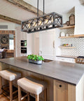 Modern Black Linear Pendant Light Four Light Fixture With Industrial Geometric Open Rectangle Frame And Antique Brass Sockets For Kitchen Island And Dining Room Vibe above a kitchen island