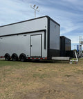 Heavy Duty Trailer Tug Man Moves Rv And Boat Trailers Up To 20K Lbs Capacity With 3500 Lb Tongue Weight Max parked on grass.