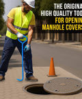 Worker using 36 Inch Manhole Hook Tool Hex Alloy Steel Heat Treated for lifting manhole cover in street.