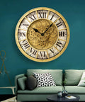 18 Inch Big Boy Gear Wall Clock With Smooth Rotating Cogs And Crisp Gold Roman Numerals mounted on a blue wall above a green couch.