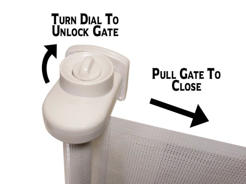 Close-up of the retractable indoor outdoor pet safety gate for doorways and stairs up to 54 inches, showing latch and operation instructions.