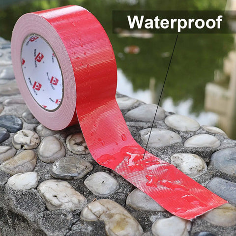 Two Pack Red Duct Tape Heavy Duty 9 Mil Thick 2 Inch By 30 Yard Roll waterproof feature shown on wet stones