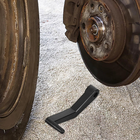 Heavy Duty 2 Piece Tire Balance Caliper Crank Handles For Wheel Measuring Tool Lightweight Non Slip Plastic visible beside a brake disc.
