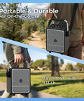 Person carrying All In One 150W Karaoke Machine With Dual Wireless Mics Portable Party PA System outdoors
