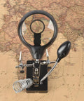 LED Light Magnifier Desk Lamp With 2.5X, 7.5X And 10X Lenses on vintage map background, showing clamp and alligator clip stand