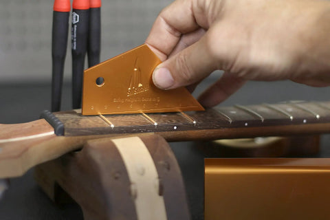Using Pro Grade Fret Leveling Kit With Fret Rocker on guitar for precise setup on 25.5 Inch F Scale Or 24.75 Inch G Scale