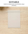 White Organza Gift Bags 100 Pack Drawstring Candy Bags for party favors and wedding decor clear sheer mesh on table