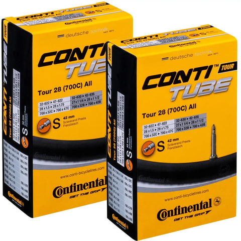 Box of Premium Inner Tubes 700x32-47 (28x1.5-1.75) 42mm Presta Valve Pack Of 2, black tubes inside yellow packaging, road bike wheels.