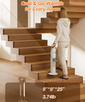 Person carrying a 25 Inch Tower Space Heater And Fan Combo With 1500W Power for all season warmth up a staircase