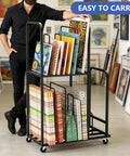 Two Tier Mobile Carton Cart With Eight Adjustable Dividers Rolling Packing Station For Home Or Warehouse, loaded with vibrant art supplies.
