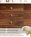 Solid Brass Gold Cabinet Knobs 4 Pack With Swallow Backplates installed on wooden dresser