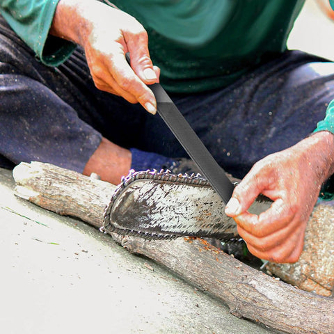 Person using 6 Inch Flat File Double Cut Teeth High Carbon Steel Hardened Without Handle Pro Grade Heavy Duty on chainsaw rakers.