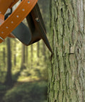 Beefed Up Heavy Duty Tree Climbing Spikes Set 1 Pair Alloy Steel Climbing Spurs 350 Lb Load Capacity on tree bark