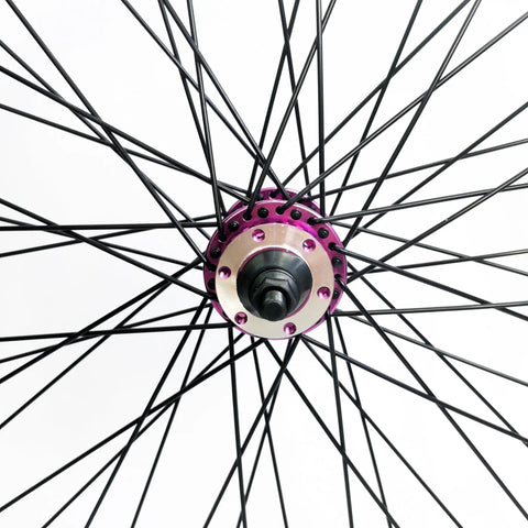 Close-up view of the hub and spokes of the Purple 26 Inch Heavy Duty Bike Rim Wheel Set With Double Wall Aluminum Alloy 12 Gauge 48 Spokes