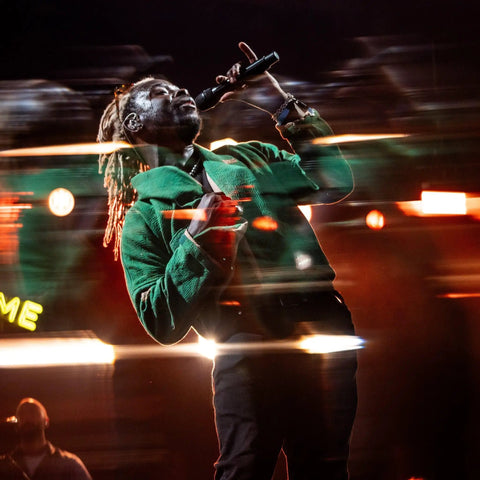 Musician performing with ghosting and motion blur using Handheld 100mm Double-Sided Prism Filter For Ghosting, Stretching, Motion Blur